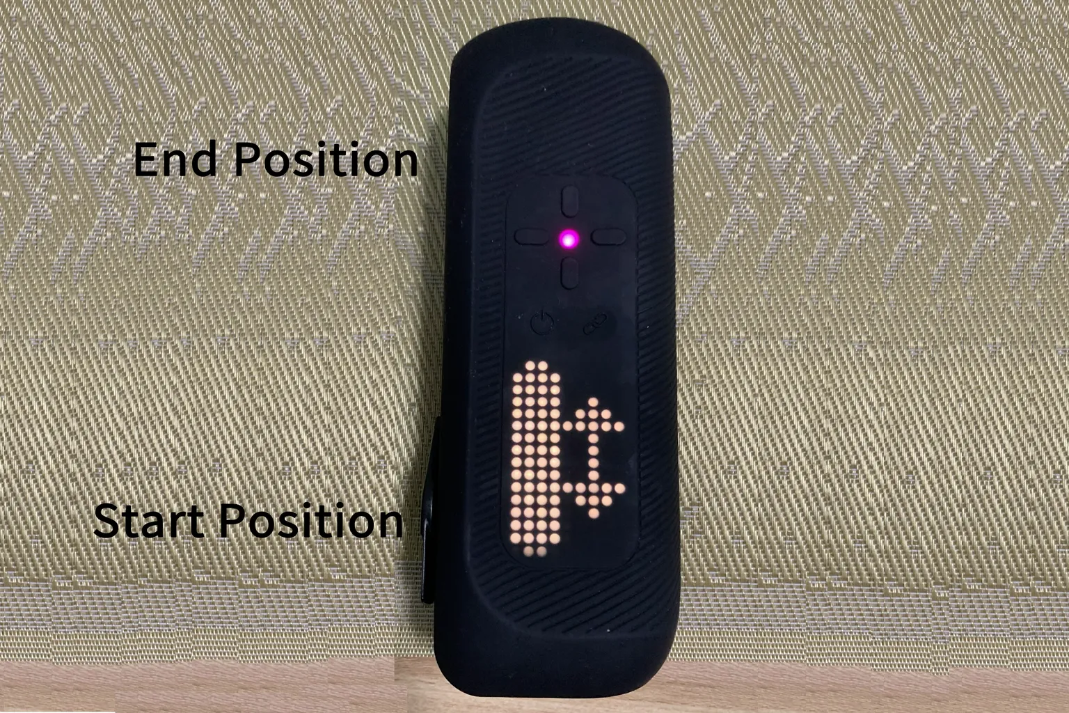 The Handy 2 Pro display showing the start and end position settings, with Japanese labels marking the endpoint and starting point positions.