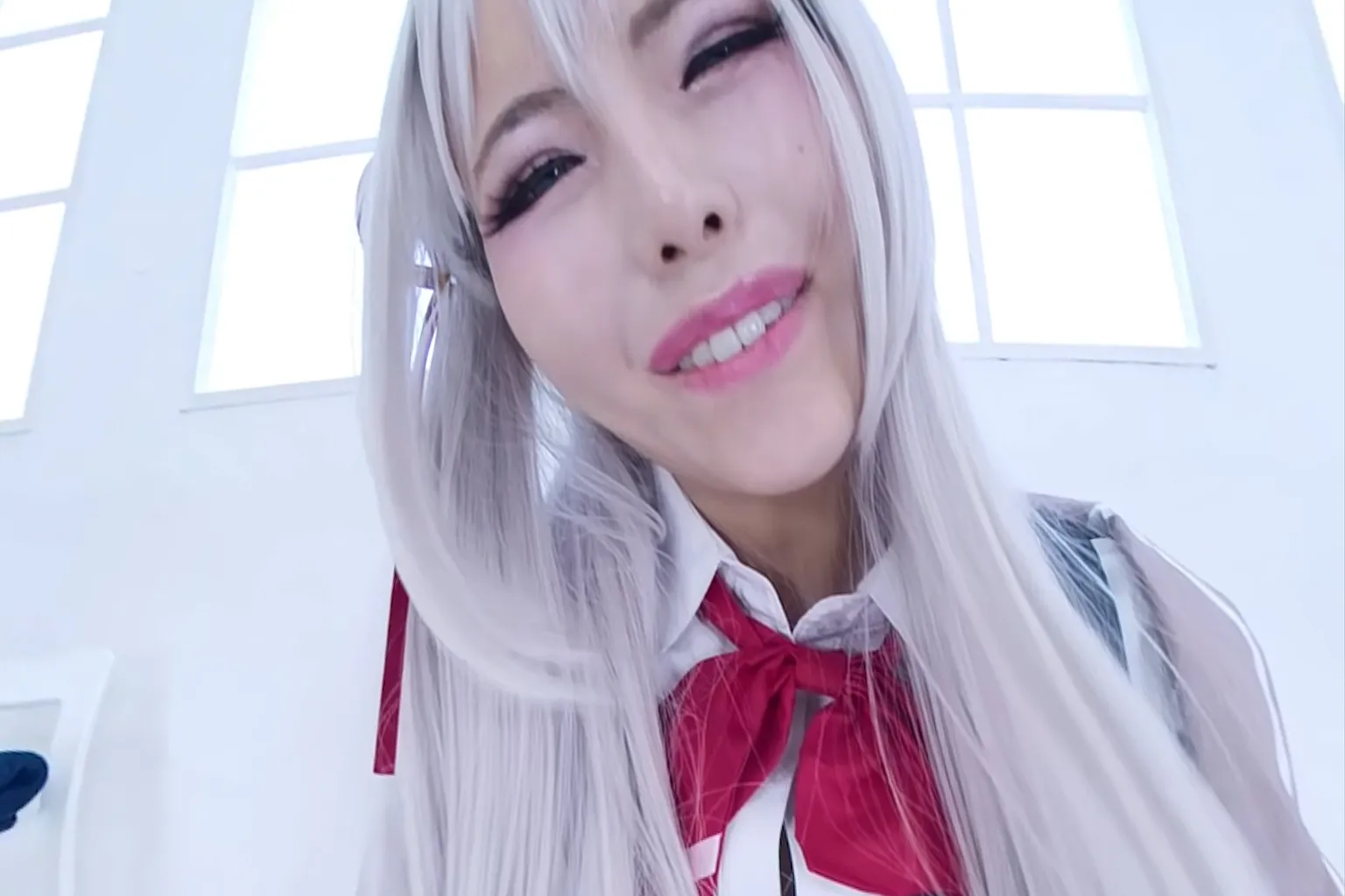 VR video produced by Japanese studio Hamezu, showing a character in a uniform approaching the camera and smiling, creating a strong sense of close-range immersion.