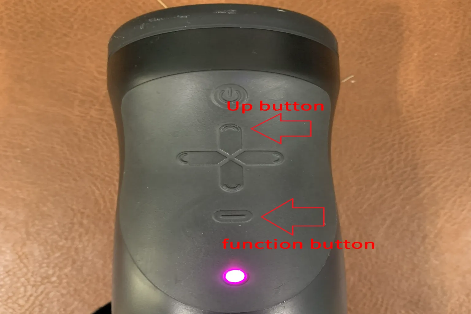 This shows the control area on The Handy device. You can see the button layout for Online mode and how the controls are arranged.