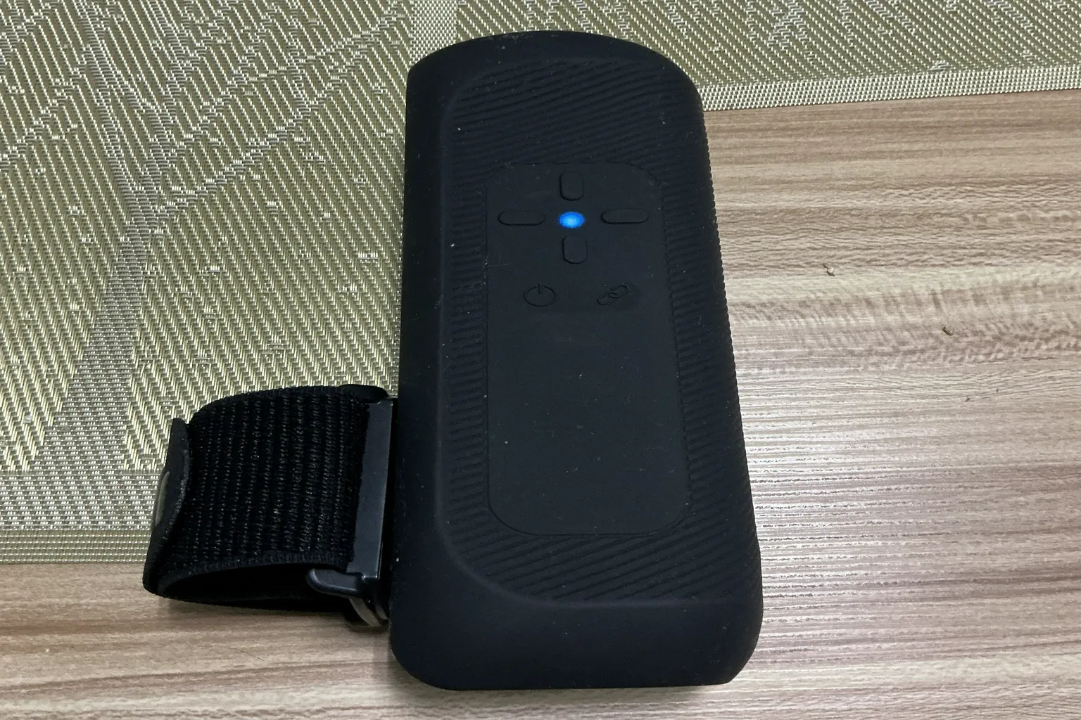 The Handy 2 Pro with a blue indicator light after Bluetooth connection, showing the device connected during setup.