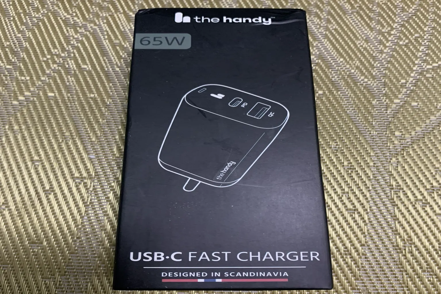 The Handy 65W USB-C fast charger retail box.